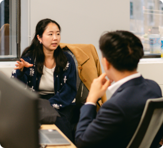 OneVest team member in conversation