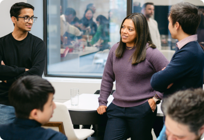 OneVest team collaborating in a meeting room