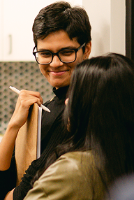 OneVest employees discussing ideas